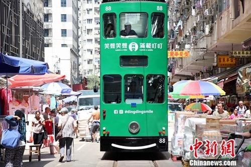 資料圖:香港回歸20年來,不少近百年歷史的街道不但風(fēng)采依然,,而且容光煥發(fā),。 資料圖:香港回歸20年來,不少近百年歷史的街道不但風(fēng)采依然,,而且容光煥發(fā),。