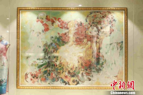 展品——大型仿油畫彩色織錦《金貴妃》,?！堦牢?攝