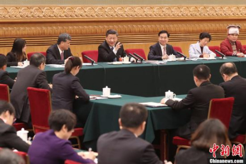 3月7日,,中共中央總書記,、國家主席、中央軍委主席習(xí)近平參加十三屆全國人大一次會議廣東代表團(tuán)的審議,。<a target='_blank' >中新社</a>記者 盛佳鵬 攝 3月7日,,中共中央總書記,、國家主席,、中央軍委主席習(xí)近平參加十三屆全國人大一次會議廣東代表團(tuán)的審議。<a target='_blank' >中新社</a>記者 盛佳鵬 攝