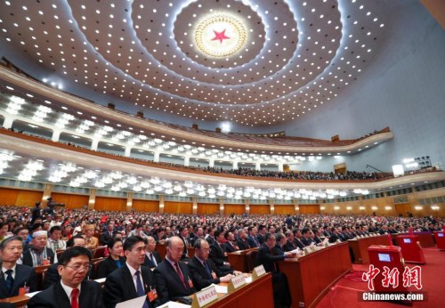 3月17日,，十三屆全國人大一次會議在北京人民大會堂舉行第五次全體會議,。 <a target='_blank' >中新社</a>記者 劉震 攝