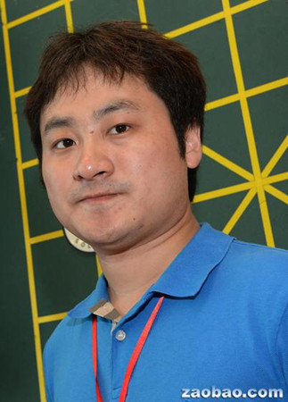 黨斐對于吉尼斯確證他1對25蒙目棋賽紀錄感到高興,,并希望更多人因此注意象棋,,愛好象棋。(檔案照片)