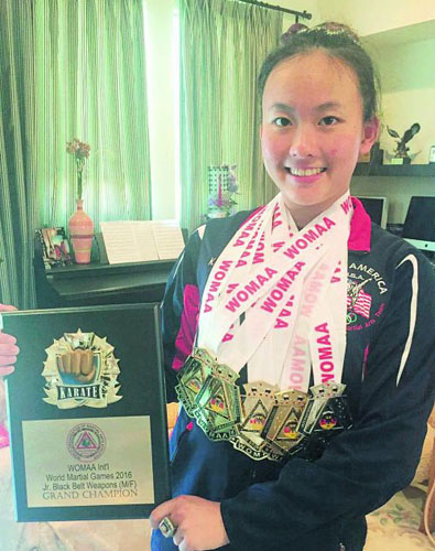 華裔空手道少女田妤倩再奪“世界比武大賽”總冠軍,。(錢(qián)女士提供)