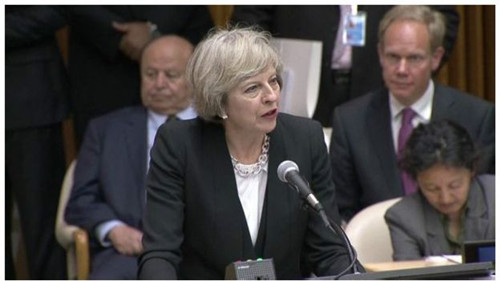 英國首相特雷莎·梅呼吁全球聯(lián)動應對移民危機。(BBC中文網)