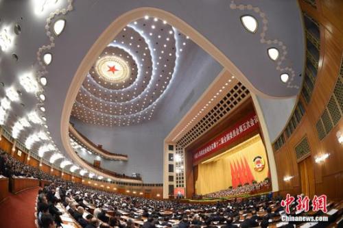 中國僑網(wǎng)3月9日,,全國政協(xié)十二屆五次會議在北京人民大會堂舉行第二次全體會議。 中新社記者 侯宇 攝