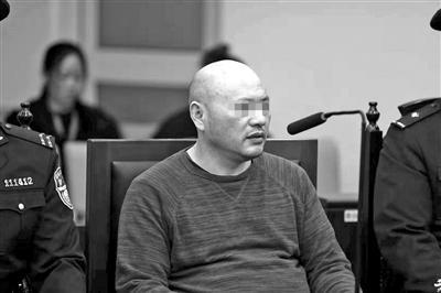 中國僑網(wǎng)被告人應某在法庭上