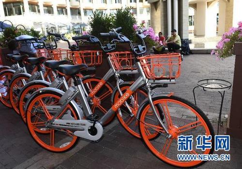 中國僑網(wǎng)9月20日,,幾輛摩拜單車停在美國首都華盛頓街頭。新華社記者殷博古攝