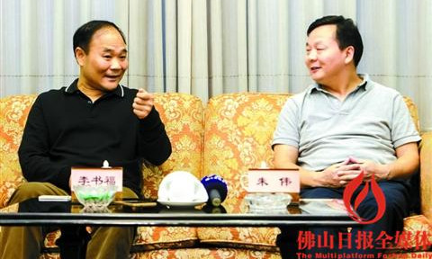 朱偉(右)會(huì)見吉利董事長李書福,。