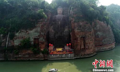 中國(guó)僑網(wǎng)樂(lè)山大佛正式“出關(guān)”,?!⒅铱 z