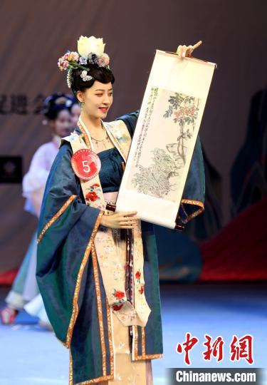 中國(guó)僑網(wǎng)圖為比賽現(xiàn)場(chǎng)?!×兆印z