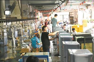 中國僑網(wǎng)企業(yè)訂單增加,,用電量增加。廣州日報全媒體記者陳楓攝