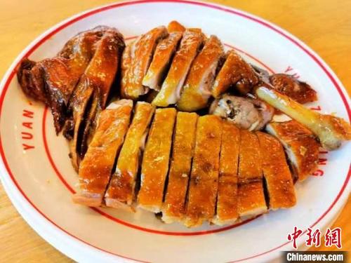 中國僑網(wǎng)“圓仔炳”汶村五味鵝 李曉春 攝