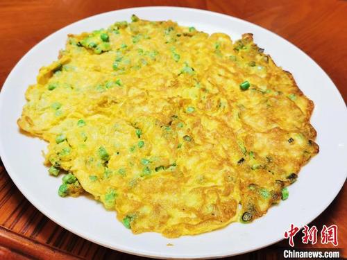 中國(guó)僑網(wǎng)豆角粒煎蛋 李曉春 攝