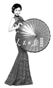 白曉蕓身穿大紅色旗袍拍攝定妝照,,手拿紙傘,,盡顯中國女性風韻