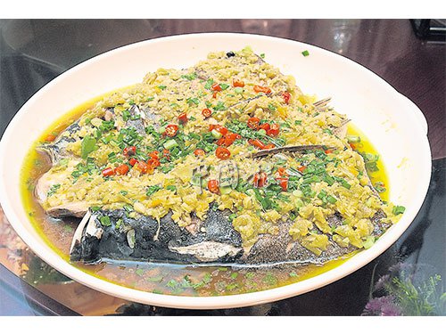 中國(guó)僑網(wǎng)菜品湘味魚(yú)頭,。(馬來(lái)西亞《中國(guó)報(bào)》資料圖)